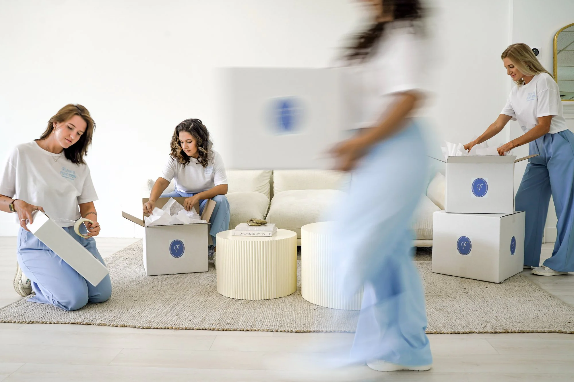 The Flow & Function team packing a client home